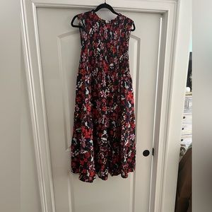 Gorgeous Navy with floral ..cinched top, flattering dress.. new with tags